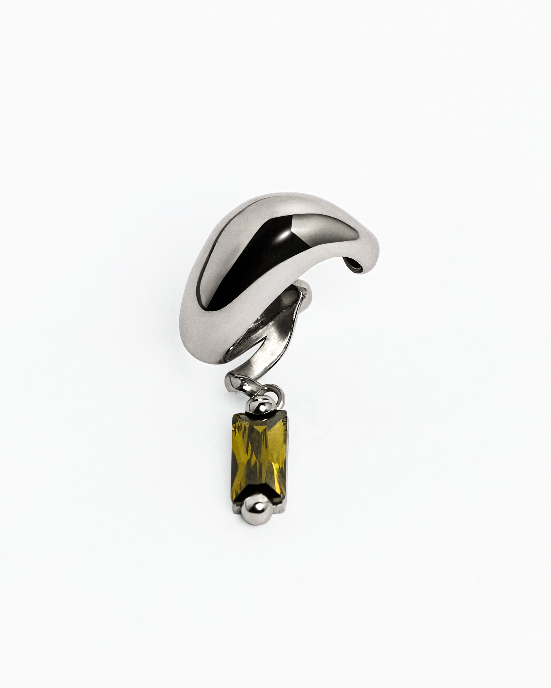 Alan Crocetti Blown Charm Green Ear Cuff in Rhodium Vermeil featuring a polished sculptural ear cuff with a suspended green baguette cubic zirconia charm.