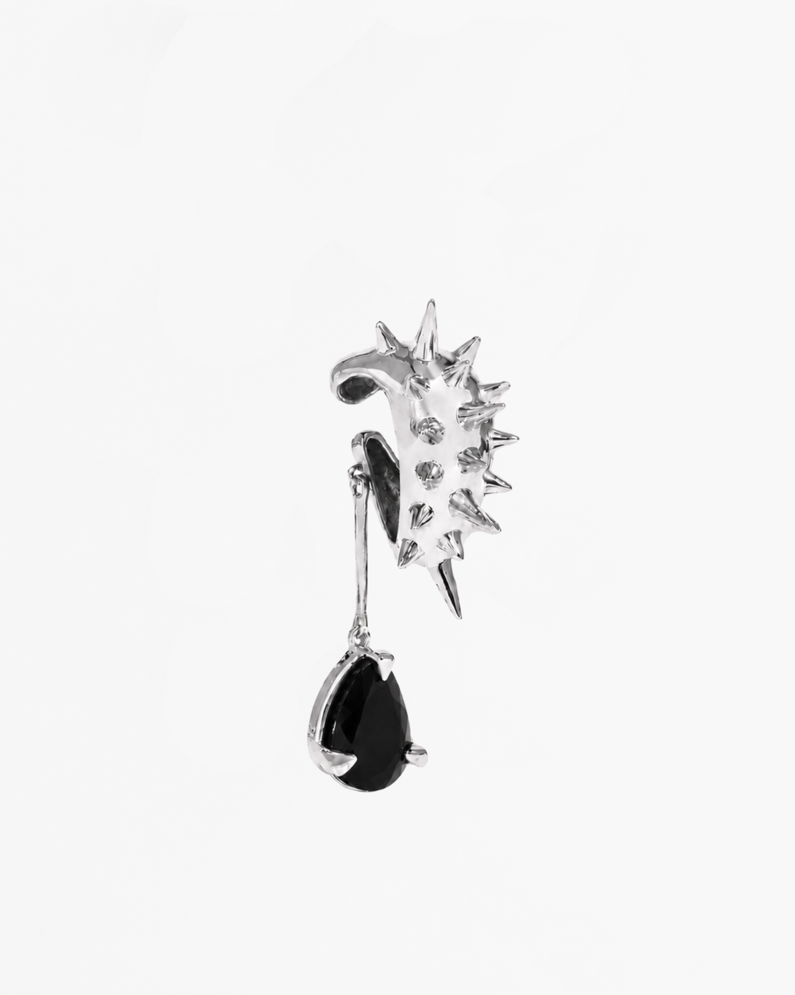 Blown Drop Spike Black Onyx Ear Cuff in Rhodium Vermeil handcrafted from 925 sterling silver featuring sculptural spikes and a black onyx drop.