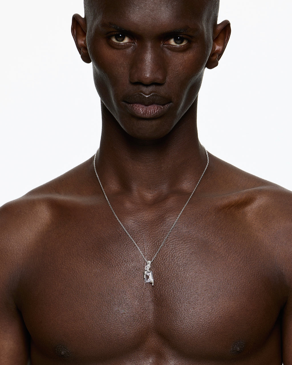 Model wearing clear melt necklace rhodium vermeil sterling silver pendant