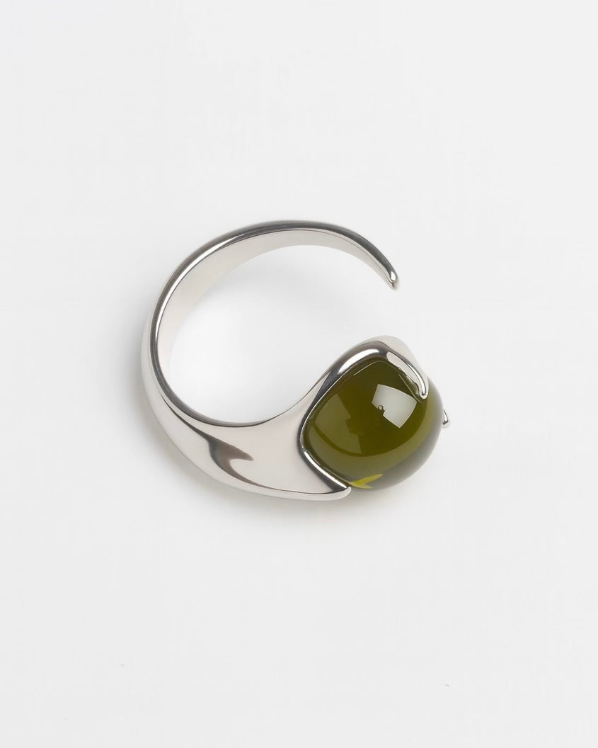 Modern silver open band ring with green cabochon stone