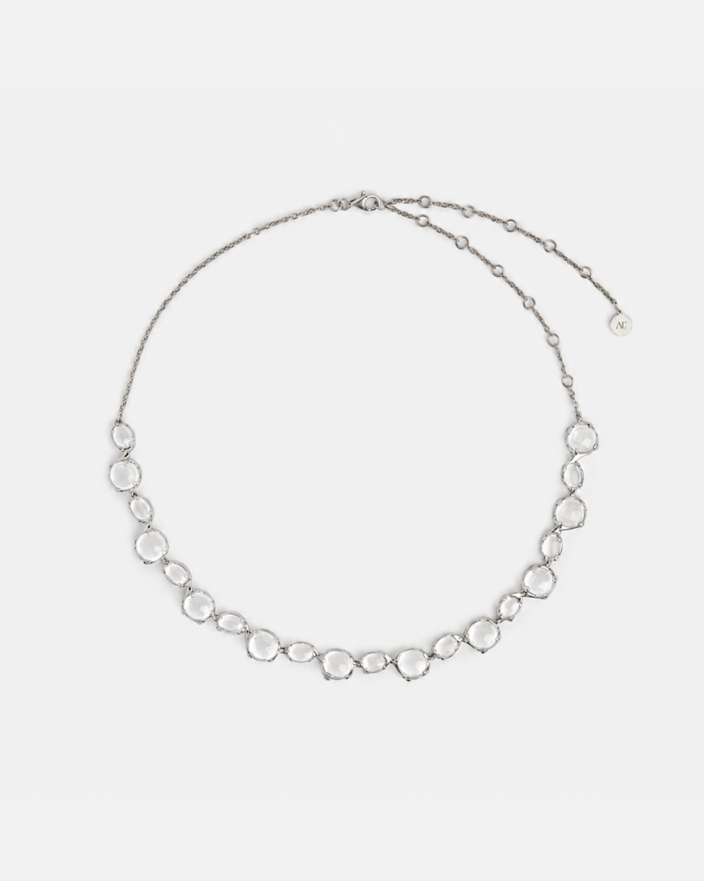 Alan Crocetti Dew Choker in rhodium vermeil and clear cabochon crystals, arranged like luminous droplets on white