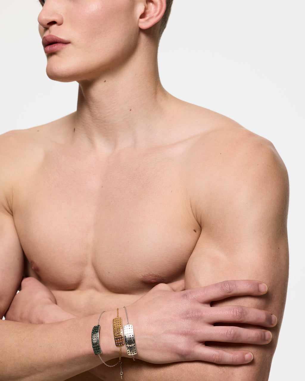 Model wearing multiple encrusted mini plaster bracelet rhodium vermeil Alan Crocetti
