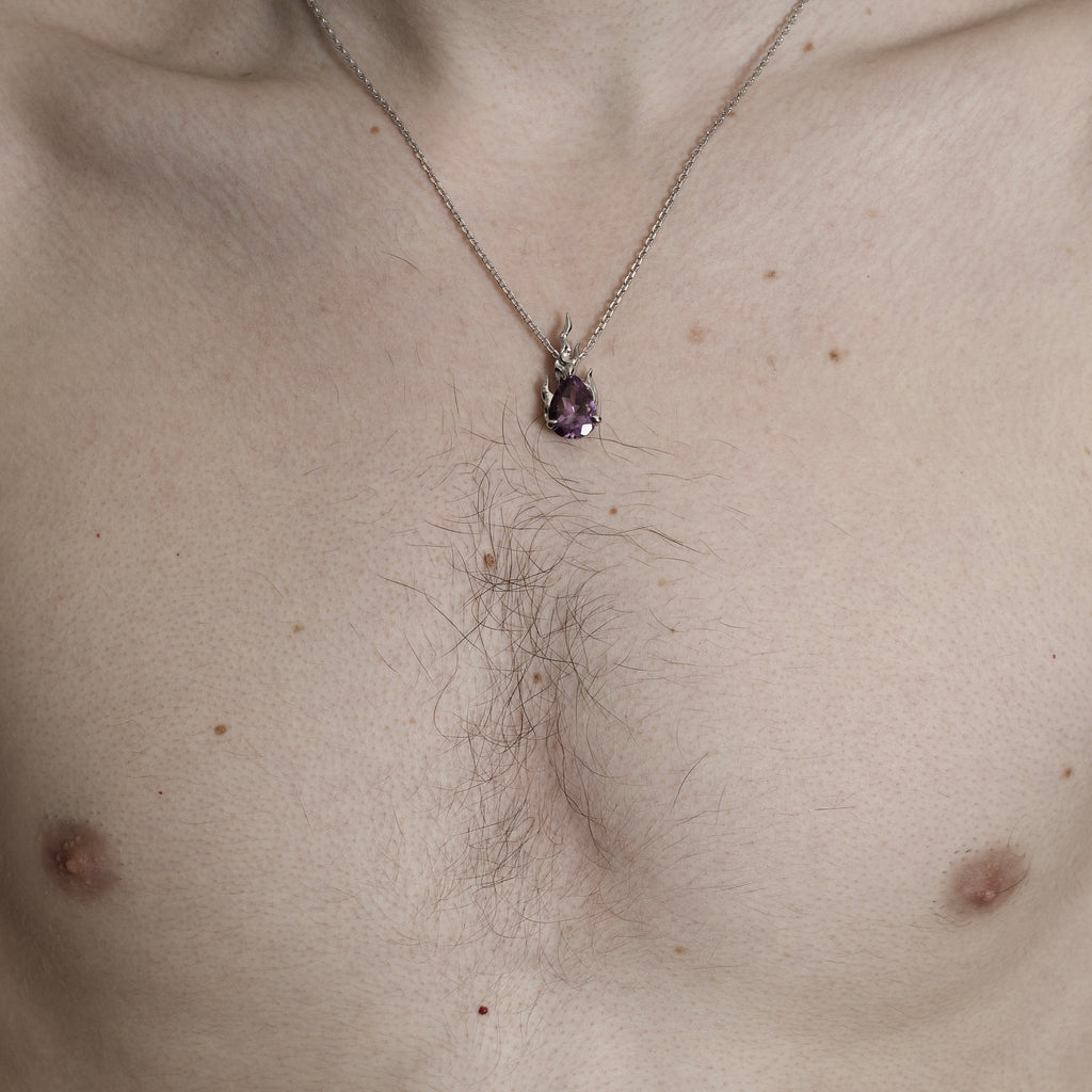Model wearing Alan Crocetti gem in heat purple amethyst claw setting necklace