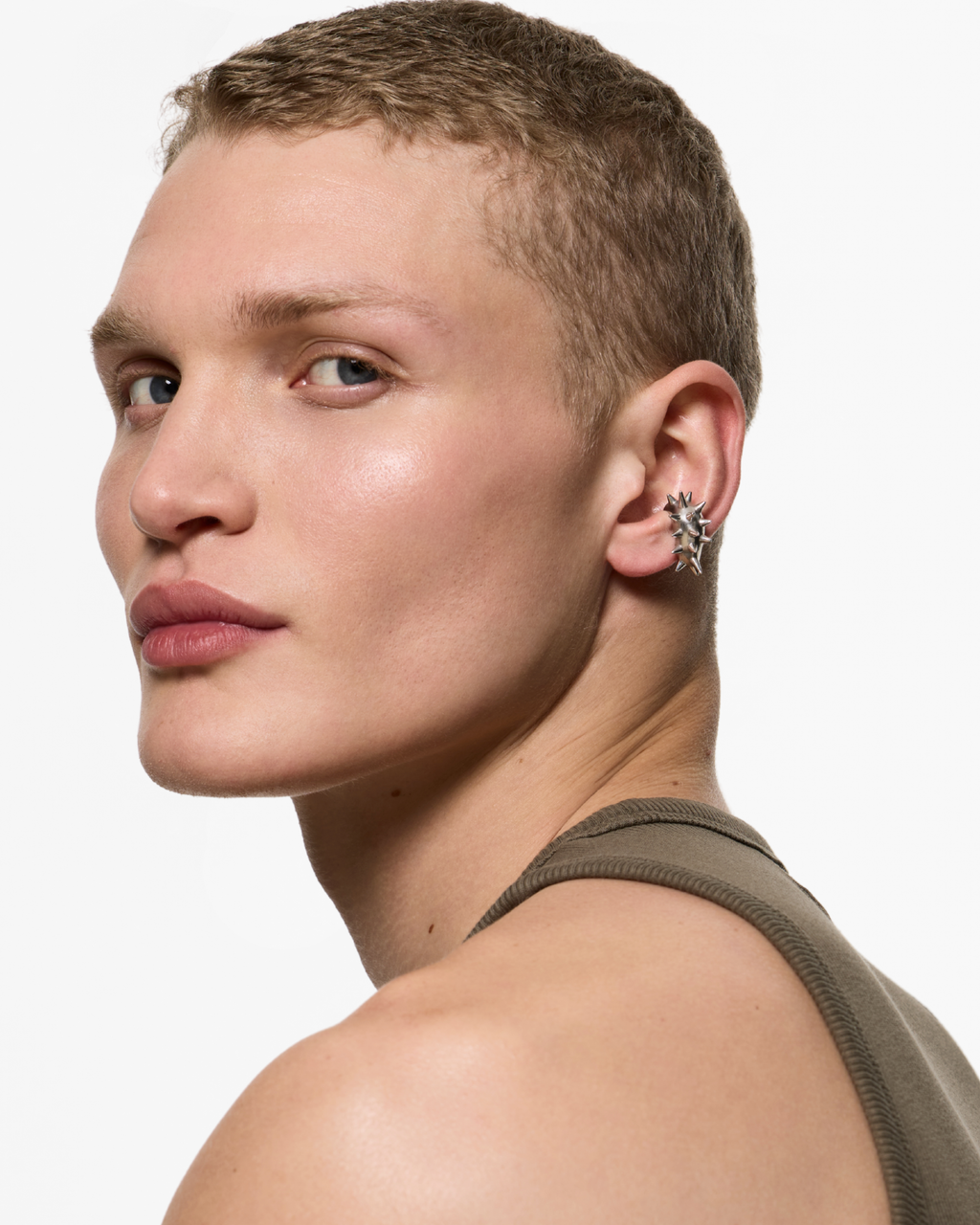 Model wearing the Gothika Nano Blown Earcuff in Rhodium Vermeil styled as a sculptural ear cuff without a piercing.