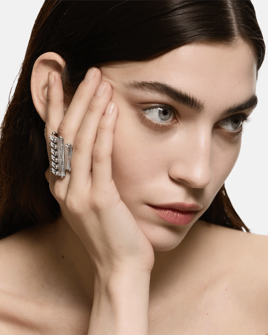 Portrait of model wearing the Maxi Crystallised Armour Clear Ring showcasing its bold sculptural silhouette.