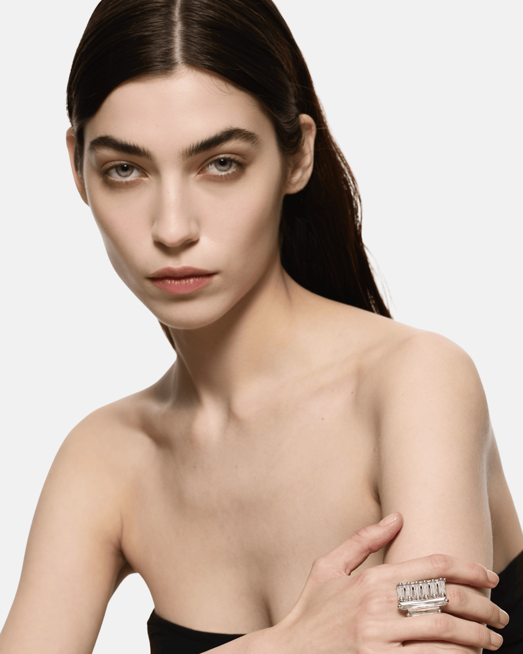 Model wearing the Maxi Crystallised Armour Clear Ring in Rhodium Vermeil by Alan Crocetti.