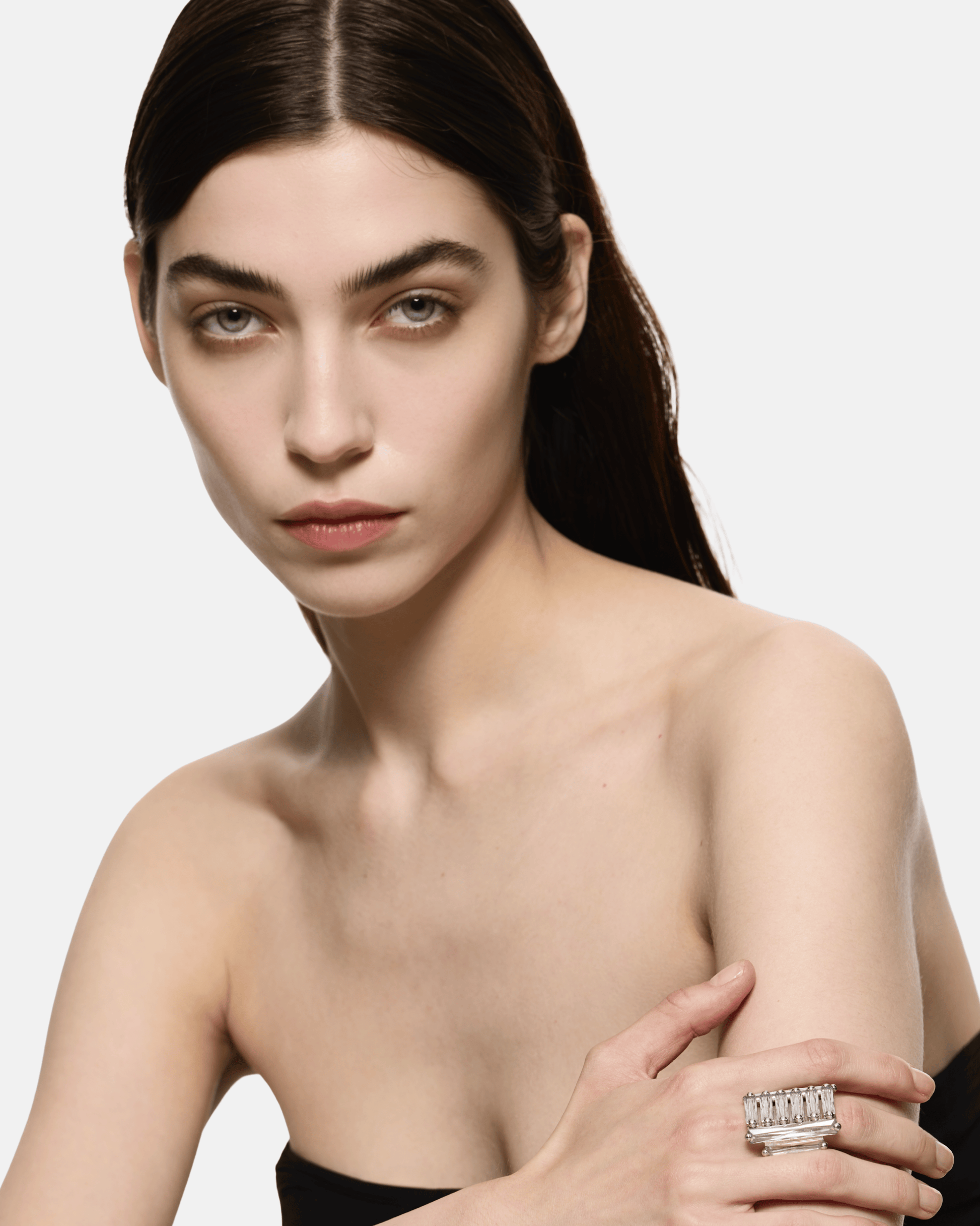 Model wearing the Maxi Crystallised Armour Clear Ring in Rhodium Vermeil by Alan Crocetti.