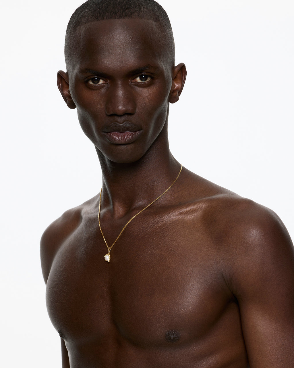 Model wears Nano Pearl melt pendant gold molten setting necklace