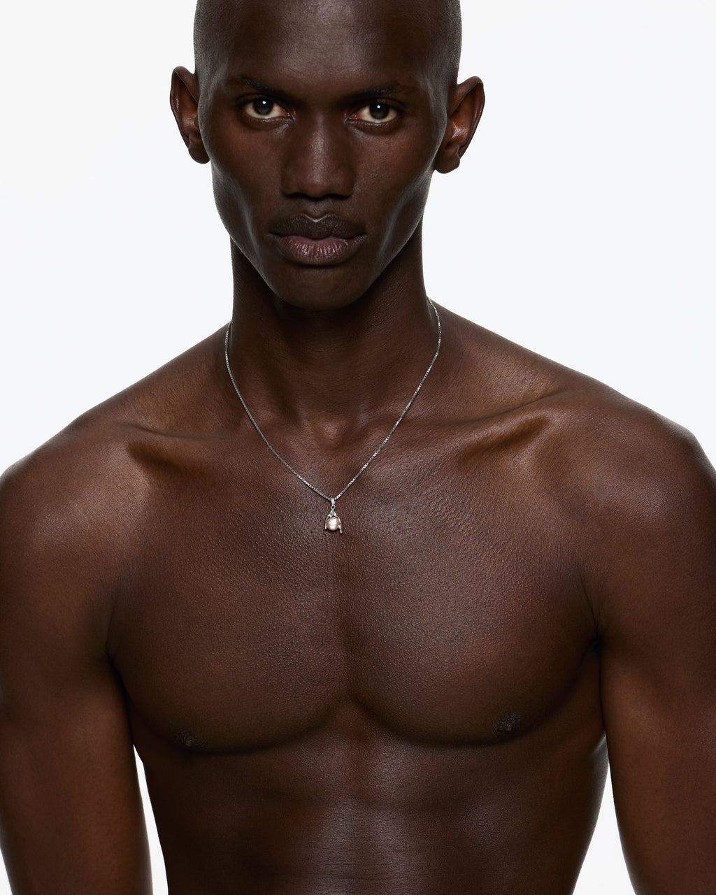 Male model wears Nano Pearl melt necklace rhodium vermeil