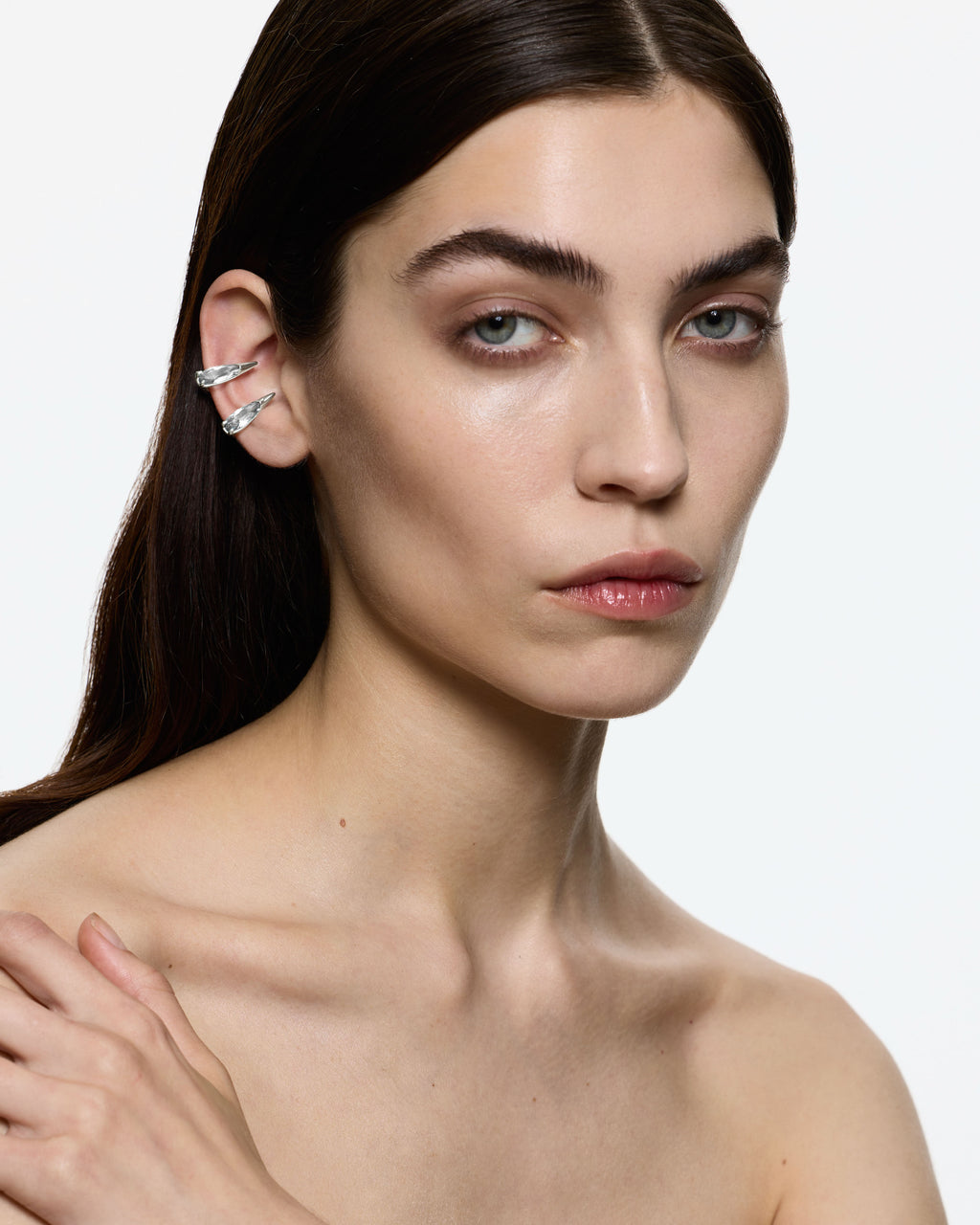 Model wearing sharp viper ear cuff rhodium vermeil zirconia