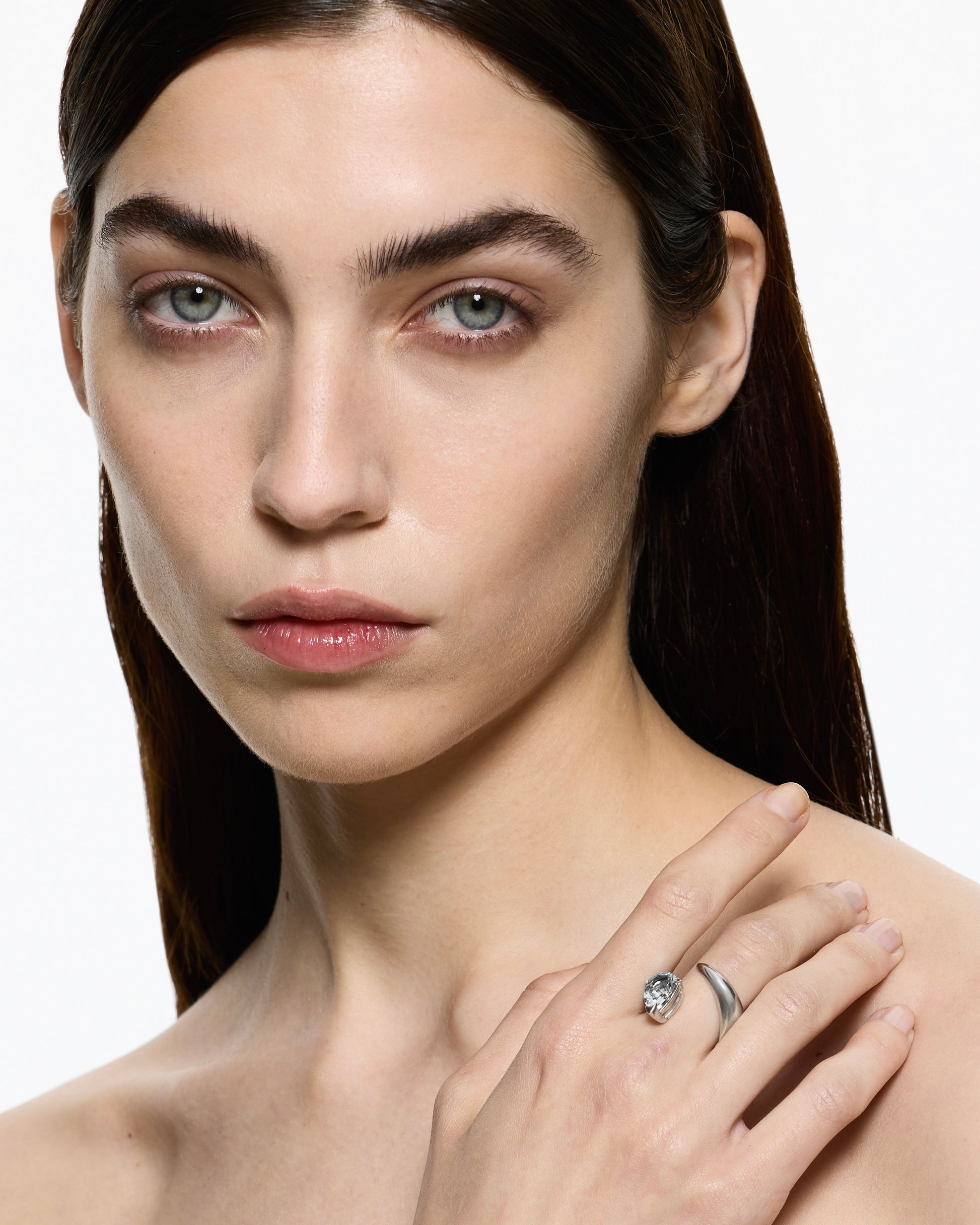 Model wearing alien ring white topaz rhodium vermeil statement ring